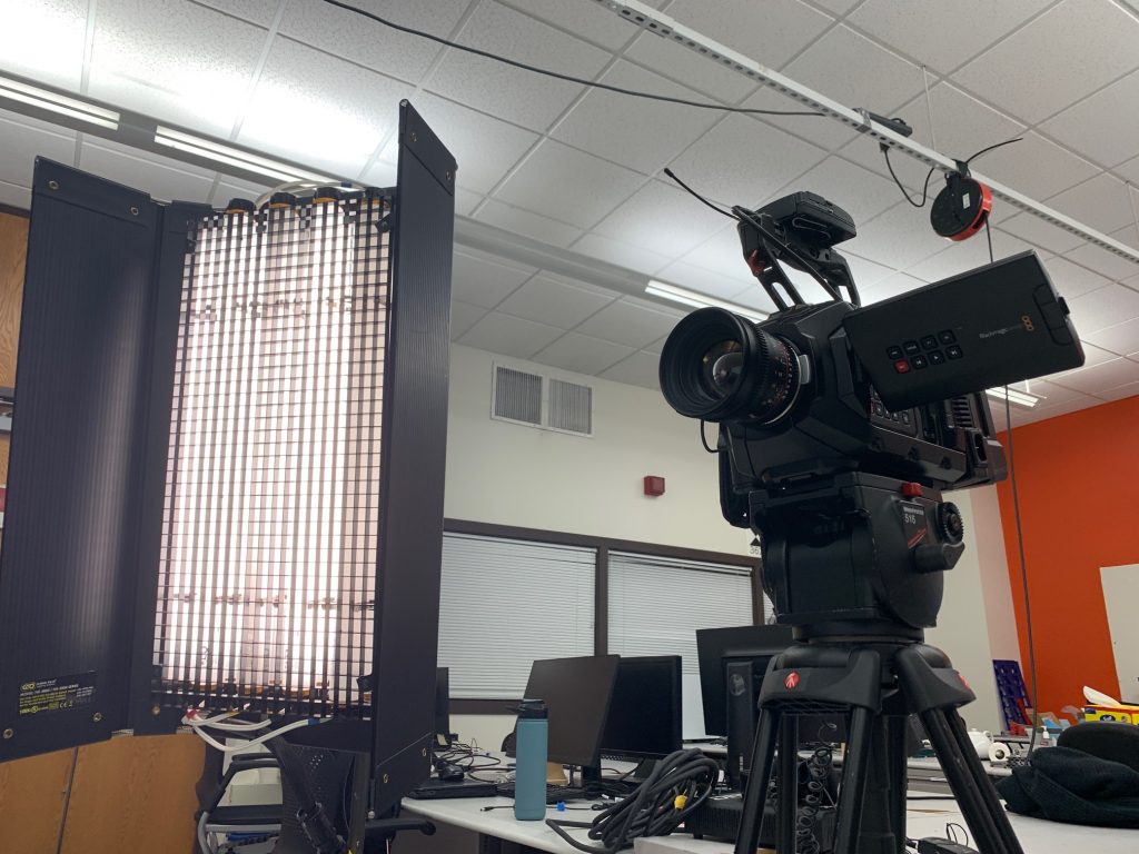 Camera and lighting setup in robotics lab.